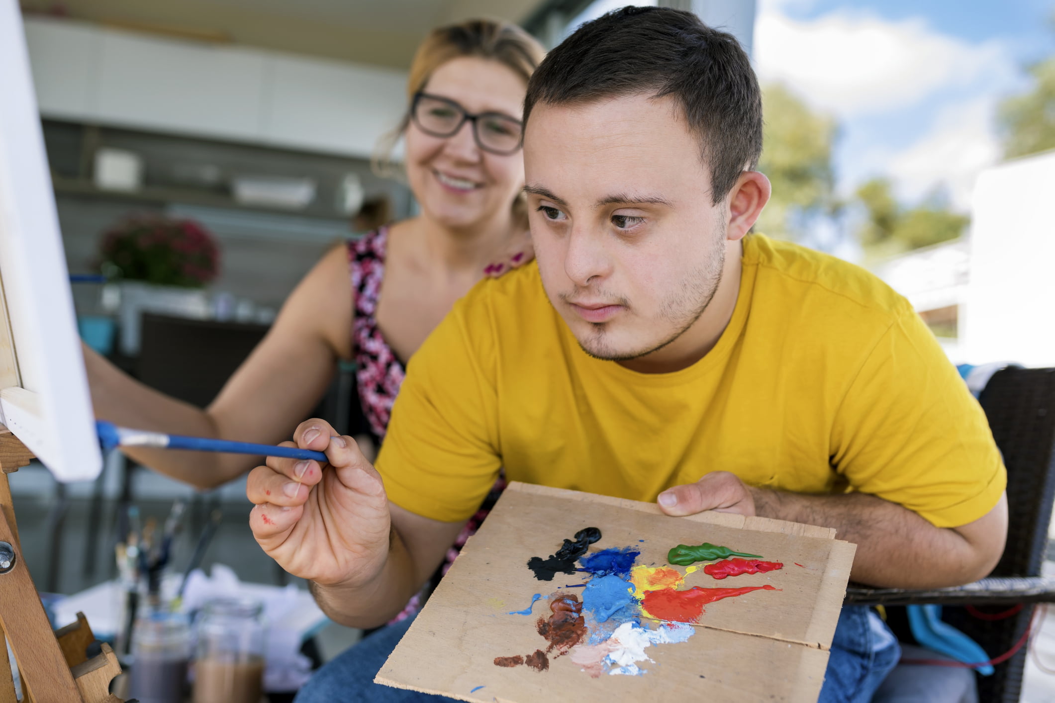 Teenager artist with Down syndrome