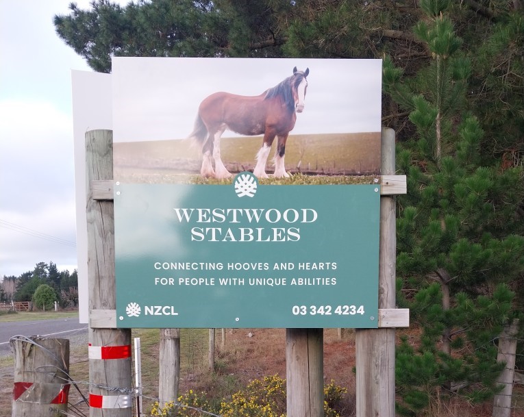 The sign for Westwood Stables